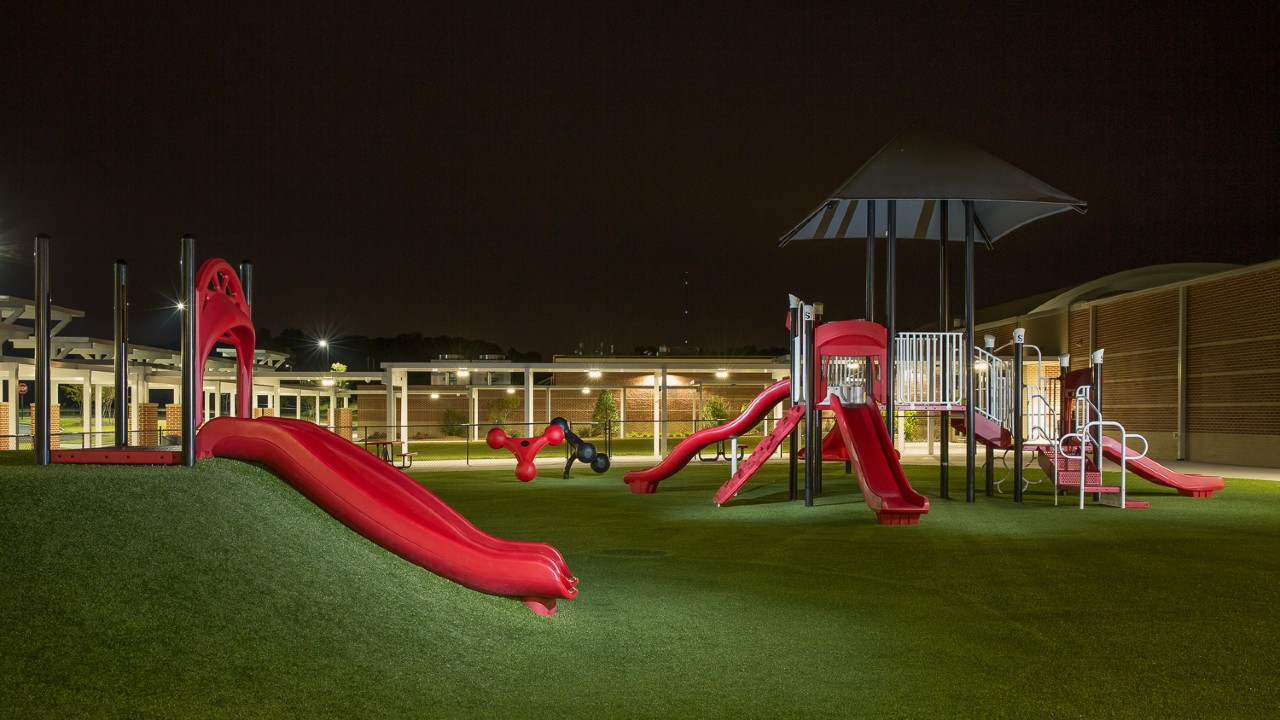 Nighttime artificial turf playground by Southwest Greens of Atlanta